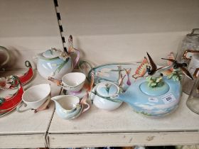 Eleven Franz porcelain items in Butterfly pattern including oval platter, teapot, cup and saucer,