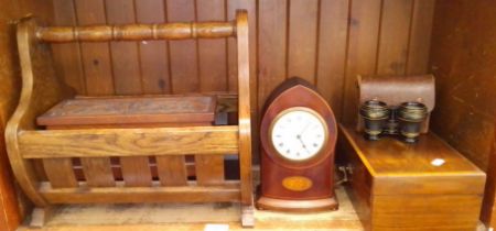 A collection of wooden ware to include magazine rack, carved wooden box, mantle clock by Boodle