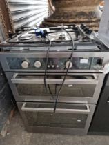 A Hotpoint oven and grill with four ring gas hob.