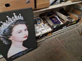 Three boxes of assorted royal commemorative items and a canvas print.