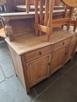 A 1930s stripped oak court cupboard.