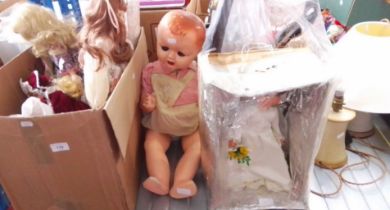 A box of dolls and 2 others