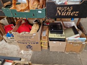 Six boxes of toys, books, magazines including a vintage growling plush teddy bear, a Paddington