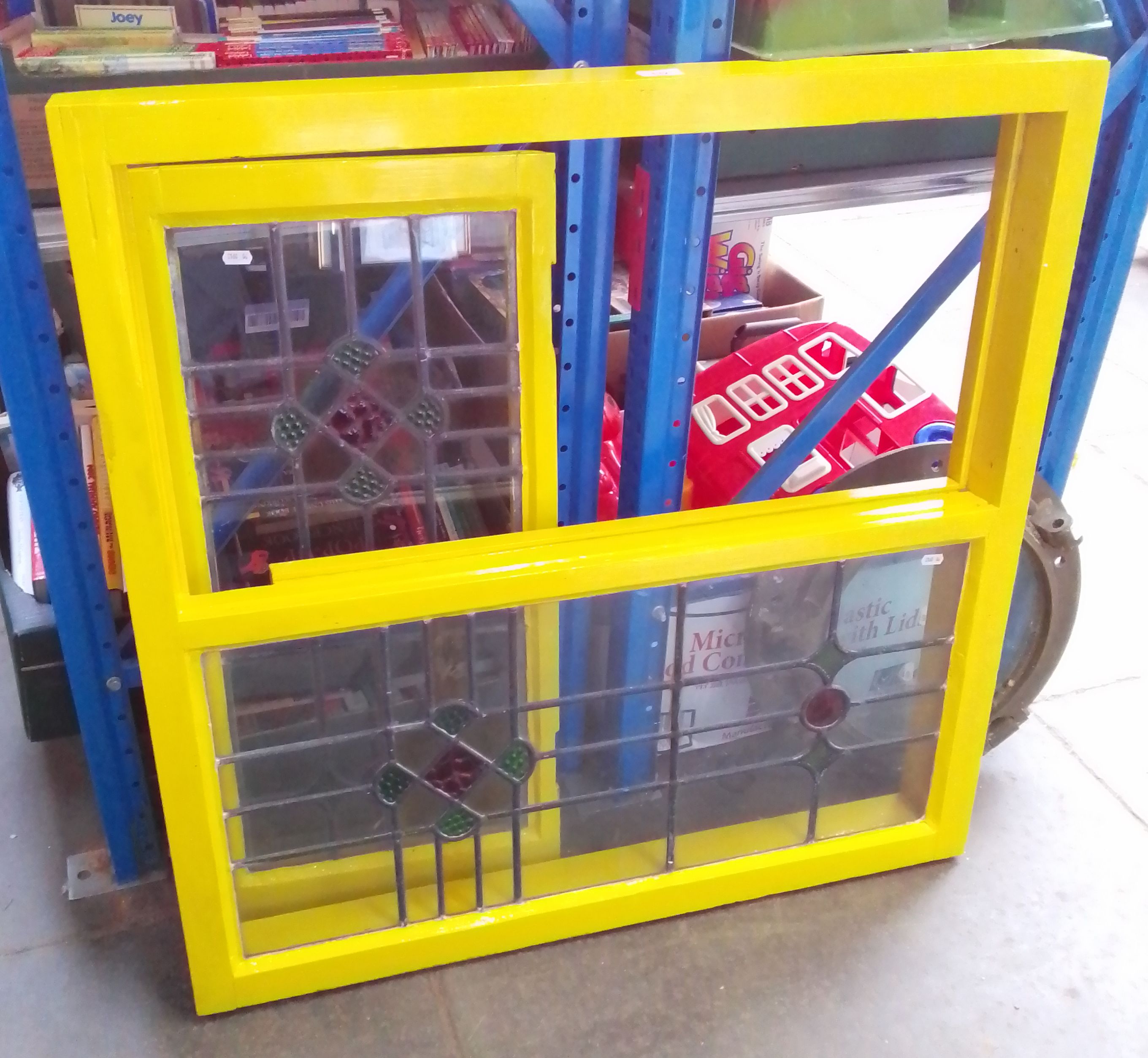 A casement window with leaded glass panels