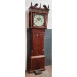 A 19th century eight day mahogany long case clock with painted moon dial by Wignall, Ormskirk,