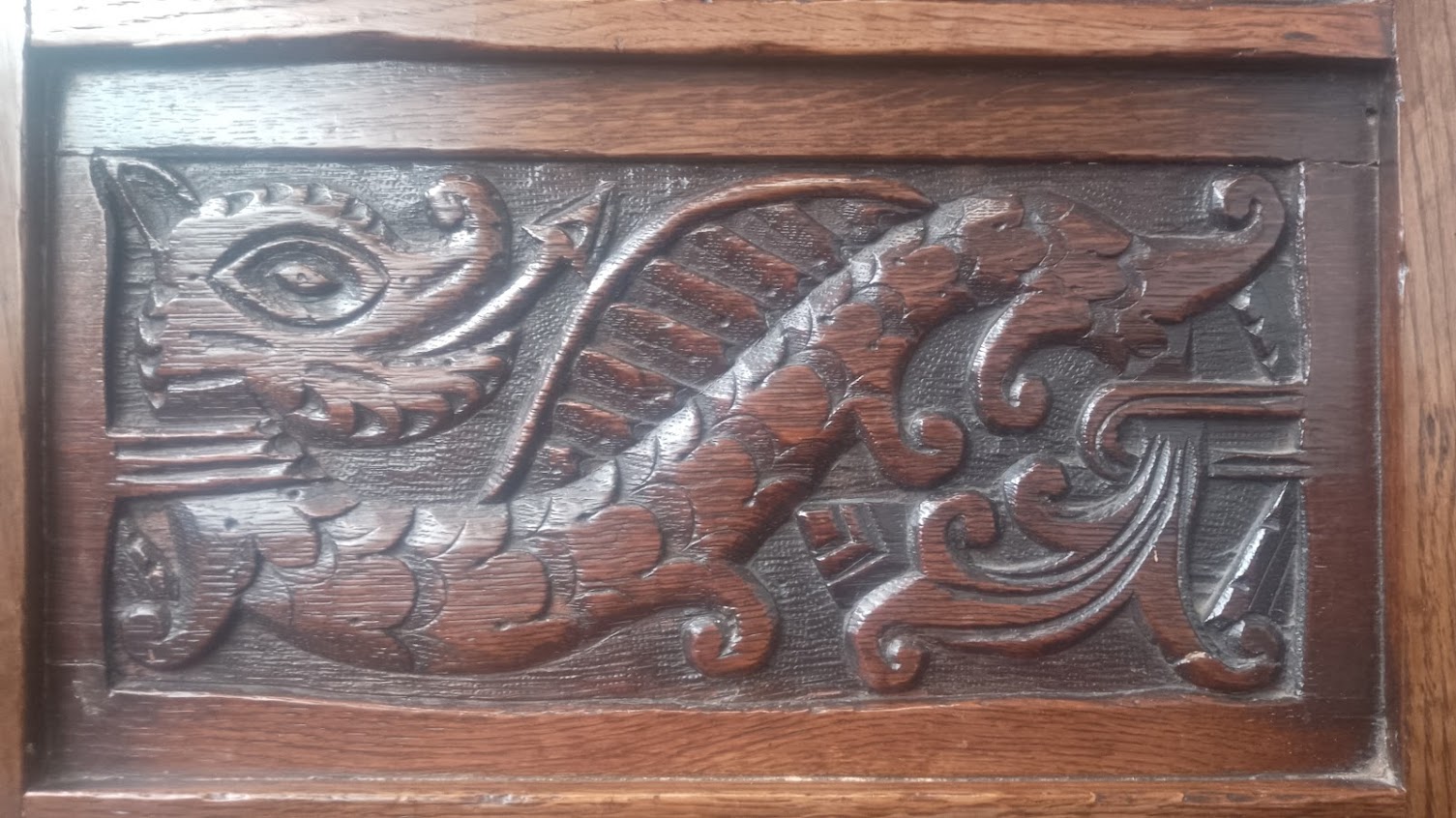 An 18th century carved oak chair with dragon to the back. - Image 3 of 7