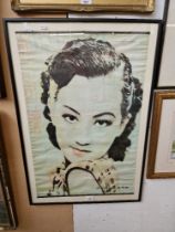 A vintage Chinese film poster of Zhou-Xuan-Chow, Chinese film star from the 1930s, framed and