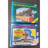 Two Hornby Trains collector's books, one Dublo and one O gauge.