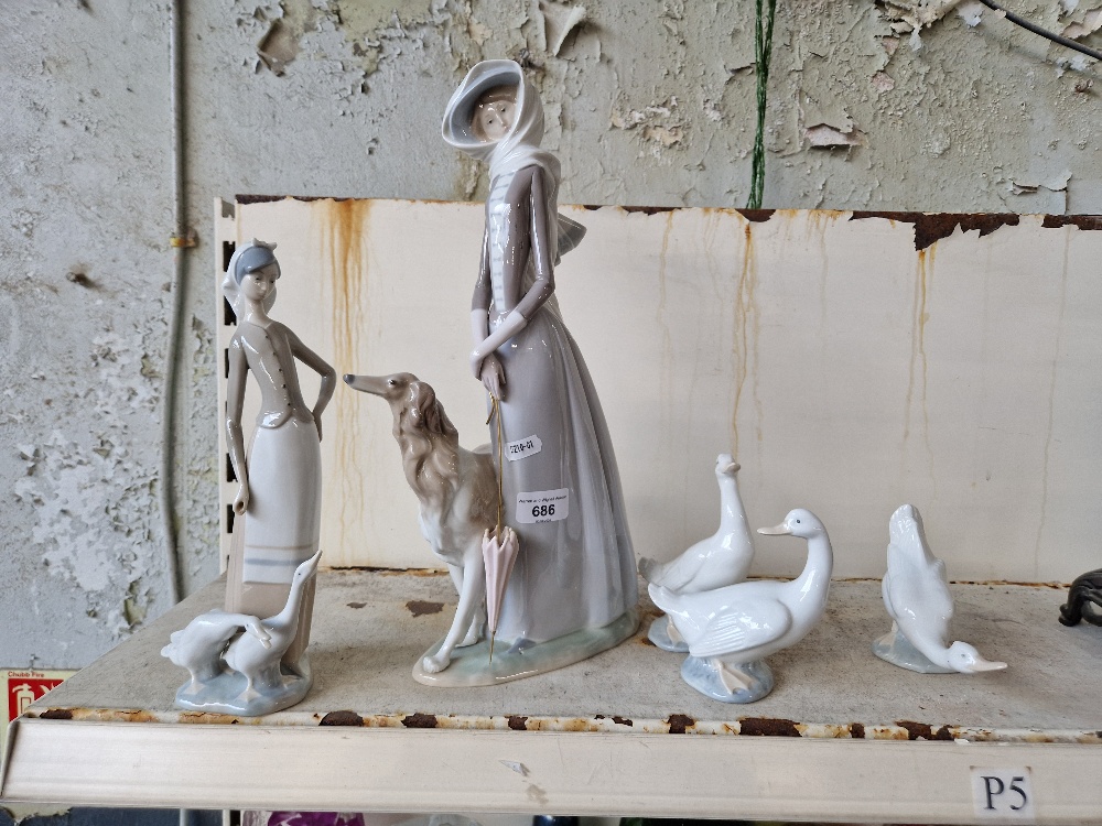Two Lladro figures and three Nao geese All in good condition with no evidence of chips, cracks or