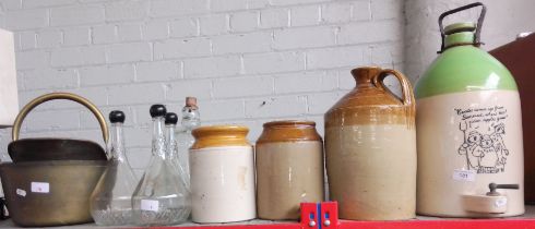 A brass jam pan and coal scuttle, 3 stoneware storage jars, Coates Cider stoneware container and 4