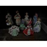 10 Royal Doulton small figurines including ‘Southern Belle’ HN3174, ‘Sara’ HN3219, Home at Last
