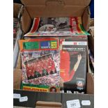 A box of approximately 50 Liverpool FC home programmes.