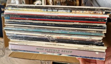 A box of assorted LPs, including Beatles, Fleetwood Mac, Kate Bush etc.