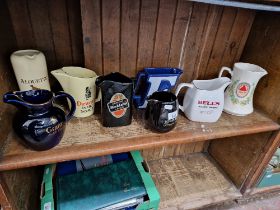 8 advertising water jugs including Grant’s, Bass, Worthington E etc.