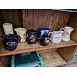 8 advertising water jugs including Grant’s, Bass, Worthington E etc.