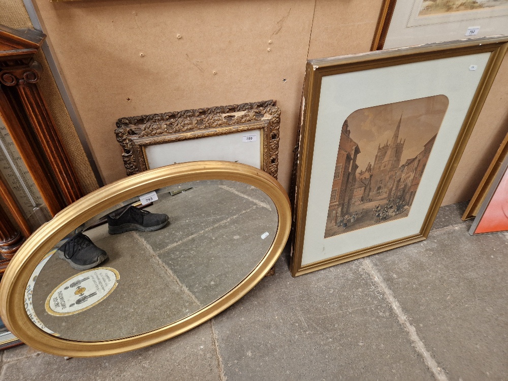 A picture and a gilt framed mirror.