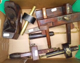 A collection of mostly 19th century woodworking hand tools including planes, spirit level, etc,