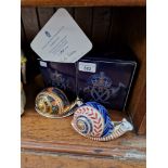 Two Royal Crown Derby paperweights. Garden Snail, limited edition issue 2824/4500, gold stopper,