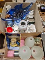 A mixed lot of ceramics and glass including a blue art glass centre piece, tea pots, light shades