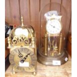 A 400 day German clock under glass dome and a brass lantern clock.