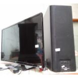 A Yamaha active servo processing sub woofer system and a 32" JVC smart tv with remote