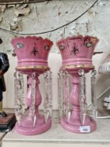 A pair of Victorian pink drop lustre vases.