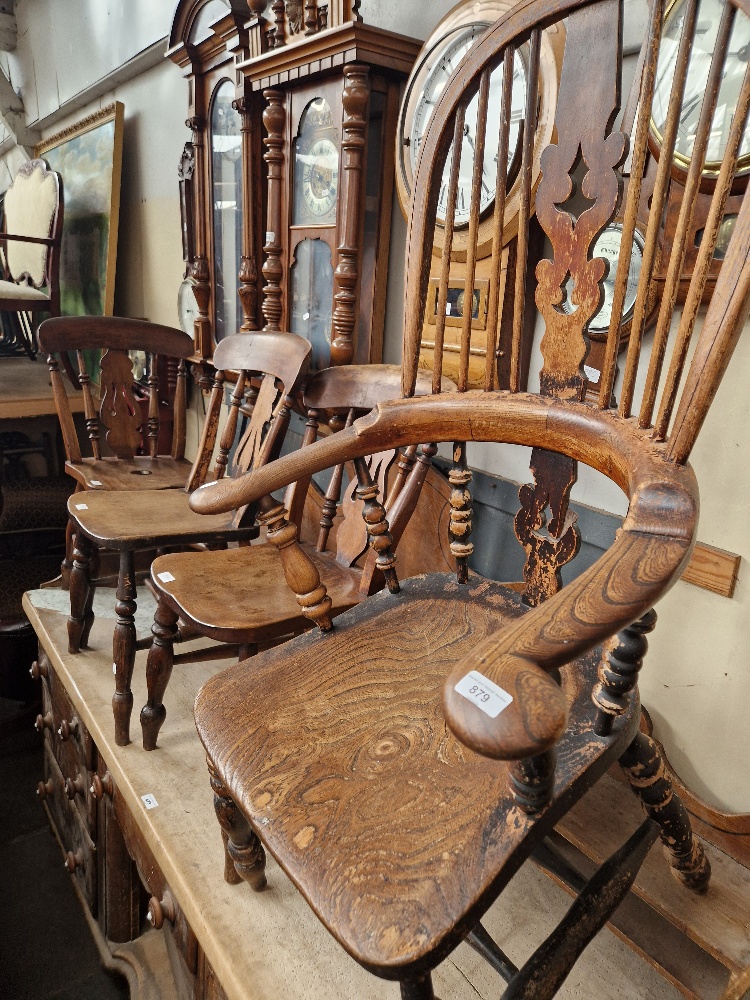 A 19th century beech and elm Windsor chair together with three beech and elm country kitchen/