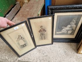 Three early 20th century photographic prints of children, two signed Johnston Lancaster, each framed