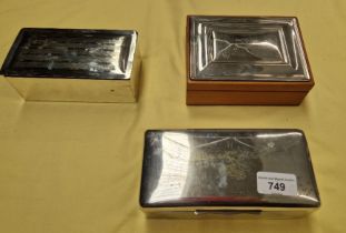 Three silver plated cigarette boxes including shipping line.