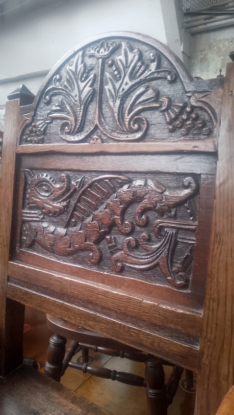 An 18th century carved oak chair with dragon to the back. - Image 2 of 7