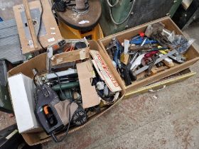 Four boxes of assorted power tools and hand tools.