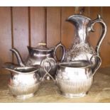 A late Victorian three piece silver plated tea set together with a matched silver plated coffee pot.