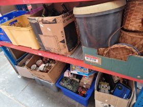 12 boxes of assorted household items including toys, pottery, baskets, magazines etc. etc.