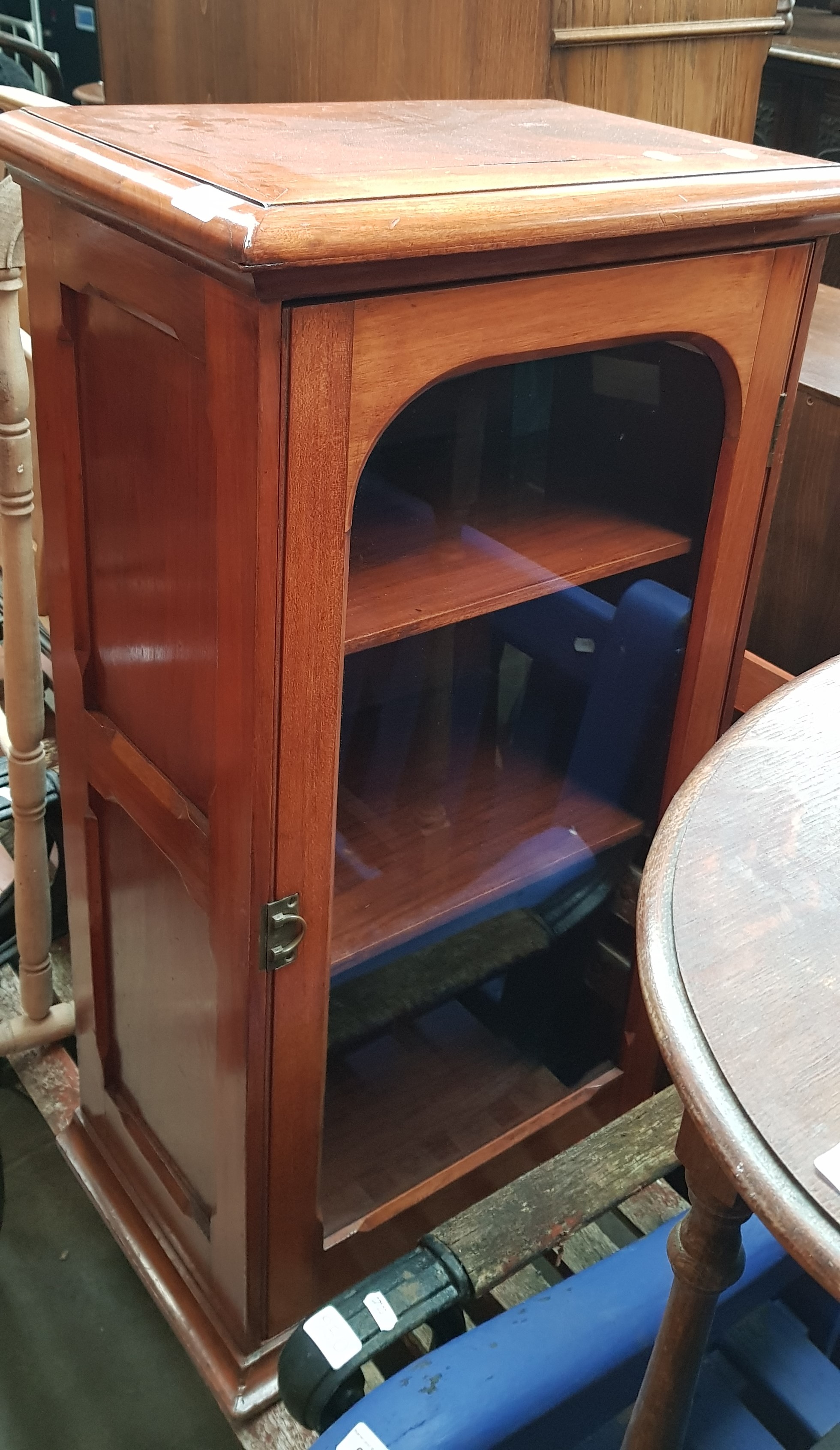 A mahogany bookcase/display cabinet.