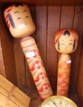 Two Japanese Kokeshi dolls, tallest 46cm.
