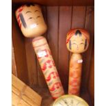 Two Japanese Kokeshi dolls, tallest 46cm.