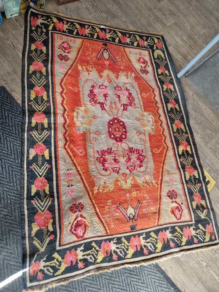 A vintage Turkish Kilim wool carpet dated 1934, geometric design, 203cm x 137cm (approx).