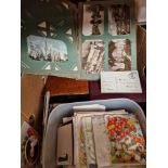 A box containg assorted postcards, cigarette cards, geeting cards & ephemera etc.