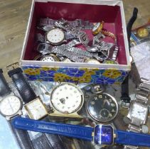 A box of assorted watches.