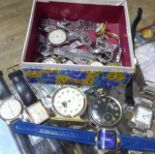 A box of assorted watches.