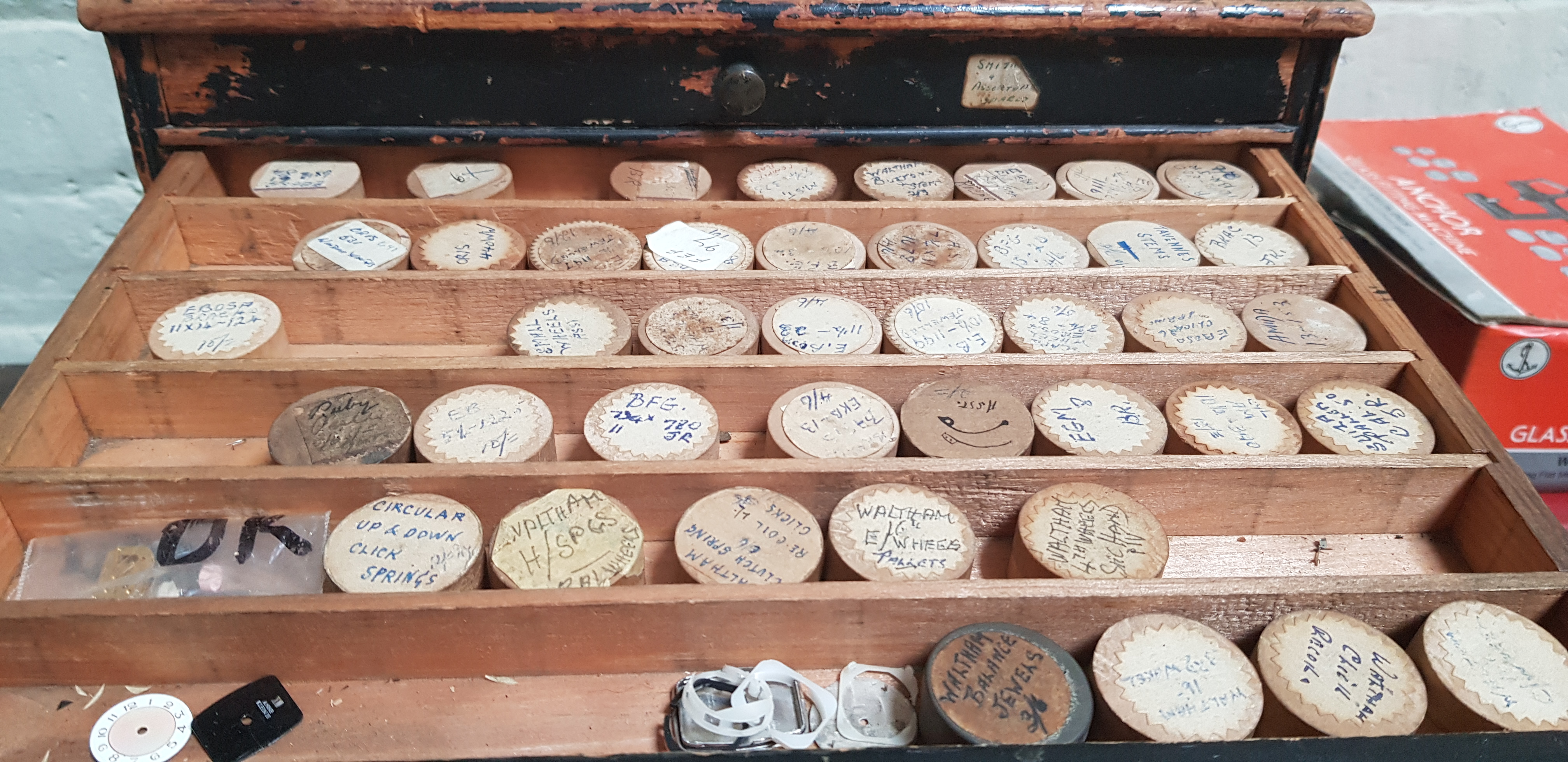 A cabinet of assorted watch spares. - Image 6 of 7