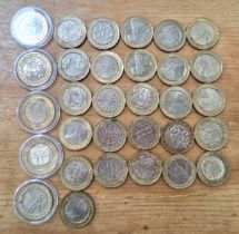 A group of 31 assorted collectable £2 coins.