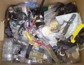 A box of assorted watch spares and repairs.