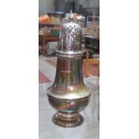 A hallmarked silver sugar shaker, height 15.5cm, weight 3.7ozt. Condition - top stiff, has been used