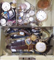 A tin of assorted watches including a gold plated Waltham, a ladies gold plated Bulova etc.