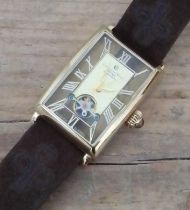 A gent's Contantin Weisz gold plated wristwatch, case length 42mm, manual wind movement, leather