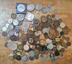 A tub of assorted GB & world coins to include a 1922 US dollar, commemorative crowns & some....