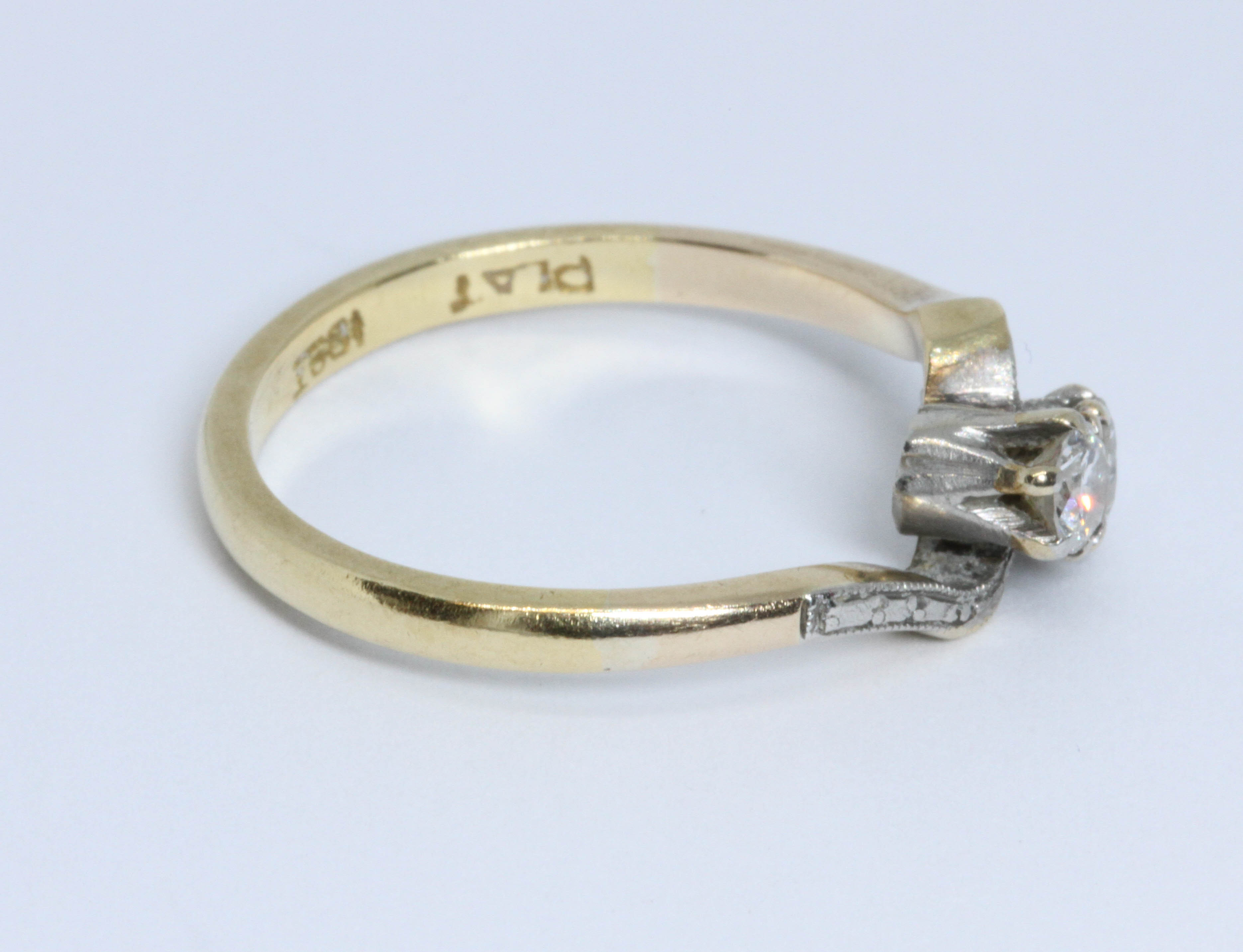 A mid 20th century two stone diamond cross over ring, total diamond weight approximately 0.22 - Image 2 of 3