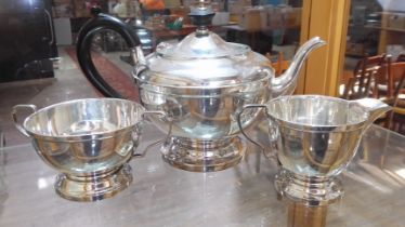 A three piece hallmarked silver tea service, gross weight 21ozt. Condition - good, general wear.