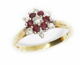 A hallmarked 18ct gold diamond and ruby cluster ring, gross weight 3.2g, size K. Condition - good,